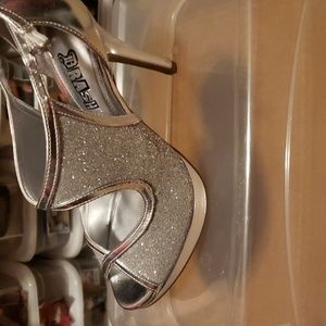 Silver glitter shoes.